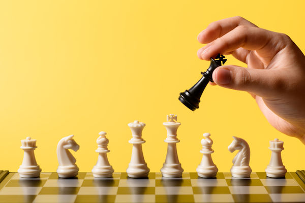 Premium Photo  Business strategy competitive ideas concept chess game on chess  board behind business background business present financial and marketing  strategy analysis investment target in global economy